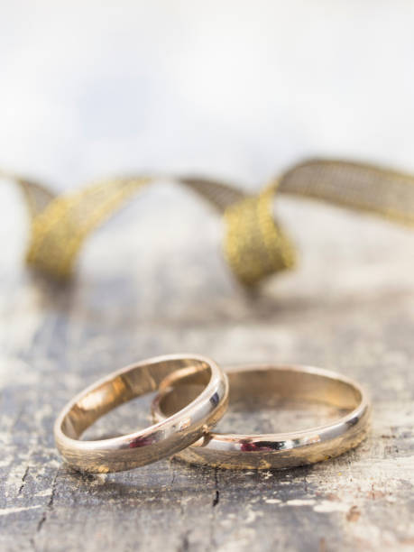 istock gold wedding rings in elegant arrangement 1130514304