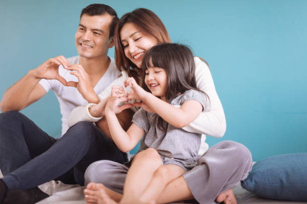 istock family making heart shape 1130518015