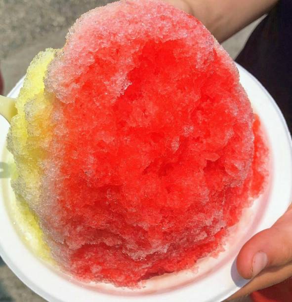 istock Fruity syrup icing Kona Hawaii on the hot day.  colourful refreshing 1130519964
