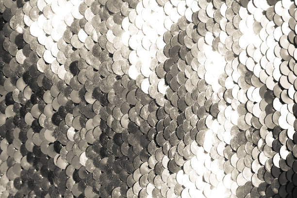 istock background of silver sequins. shiny sparkling background 1130520299