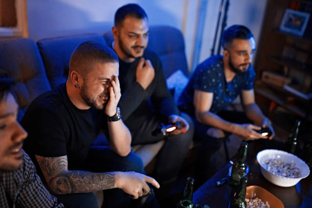 istock Friends playing video games 1130520333