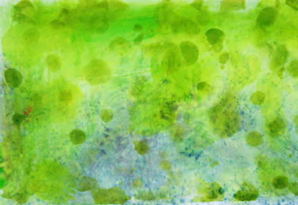 istock Bright green and blue rough textured background 1130521952