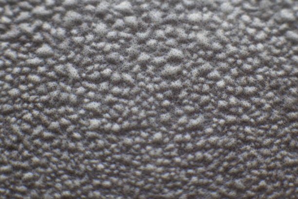 istock drop close up. water drop on concrete wall 1130522843