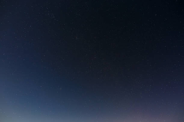 istock Stars in the night sky. Outer space background with the full moon photographed. 1130523081