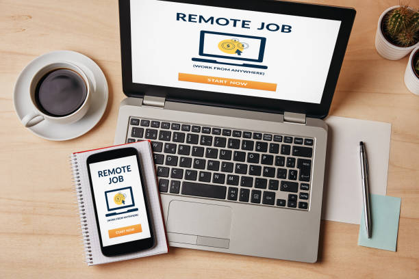istock Remote job concept on laptop and smartphone screen 1130523103