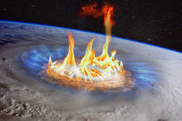 huge gas stove burner between hurricane in a planet earth, satellite view, armageddon conceptual image. elements of this image furnished by nasa. - blue flame natural gas fireplace imagens e fotografias de stock