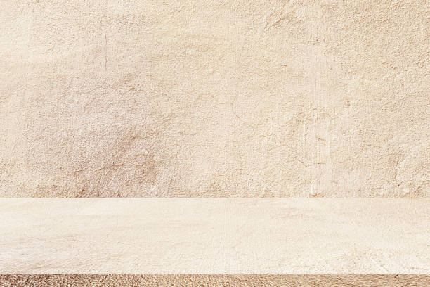 textura de fondo de pared color bronceado de cemento con azulejo llano de perspectiva de piso para ver de cerca o anunciar o promocionar productos y contenido en pantalla - rough nobody textured wall fotografías e imágenes de stock