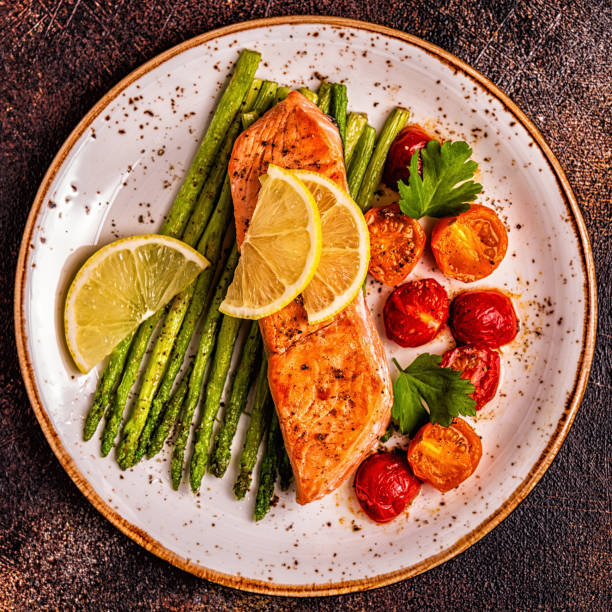 istock Grilled salmon with asparagus and tomatoes 1130524745