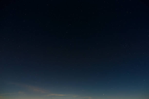 istock Stars in the night sky. Outer space background with the full moon photographed. 1130524932