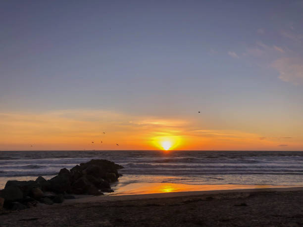 istock Watching the sunset over the pacific ocean in Venice, CA in wintertime 1130524984