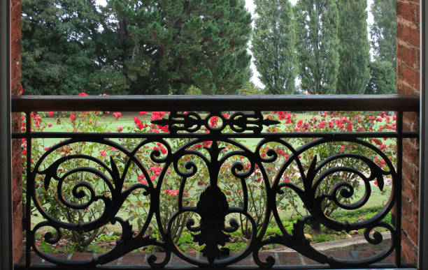 istock Apartment with garden view  Balcony with wrought iron gate 1130528368