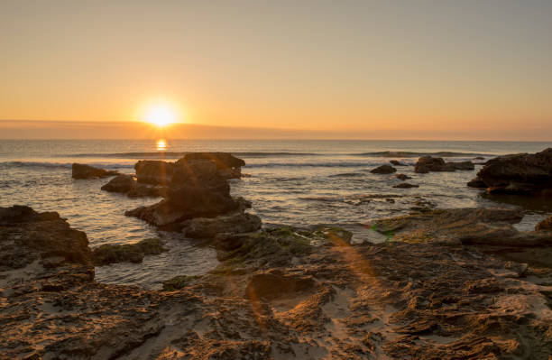 istock A sunrise between the rocks of Oropesa del Mar 1130528399