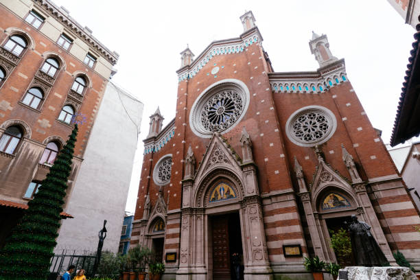 St. Antuan Church, Beyoglu, Istanbul, Turkey - February 14, 2019: Exterior view and tourists in front of the old church.