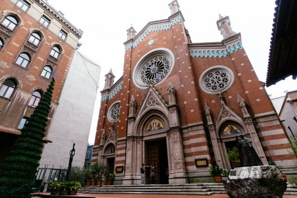 St. Antuan Church, Beyoglu, Istanbul, Turkey - February 14, 2019: Exterior view and tourists in front of the old church.