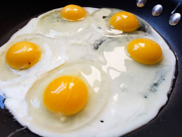 Eggs Cooking Over Easy
