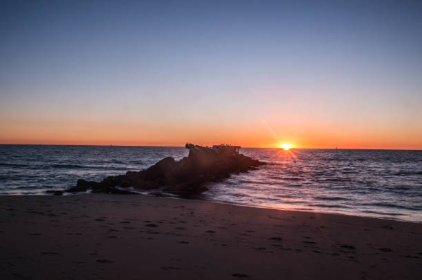 istock Waves crash along the rocks of a broken down pier in Playa del Rey, CA 1130536866