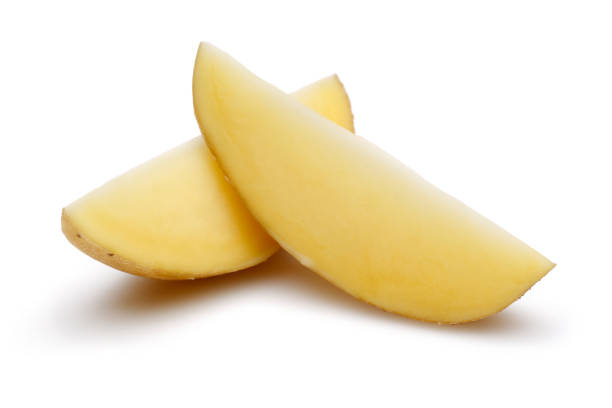 istock Fresh potato slices isolated on white 1130539870