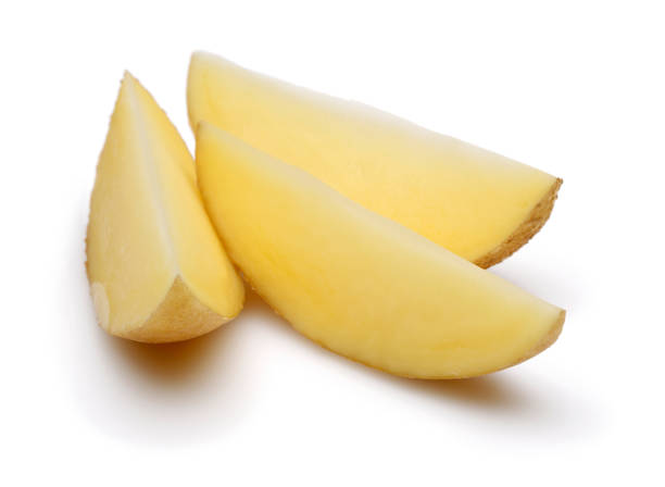 istock Fresh potato slices isolated on white 1130539881