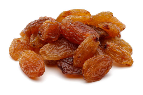 istock Golden raisin isolated on white 1130541667