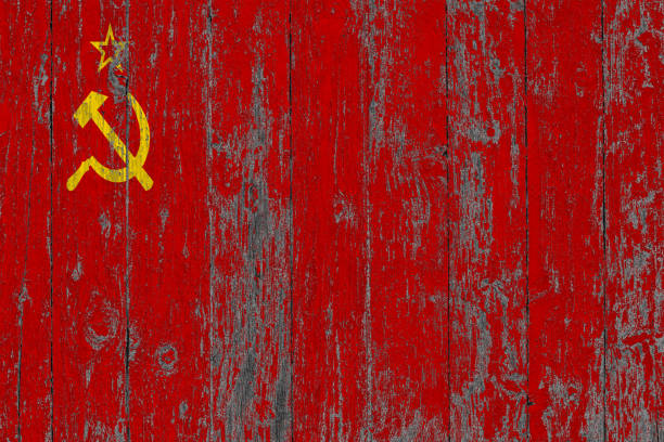 istock Flag of Soviet Union painted on worn out wooden texture background. 1130541682