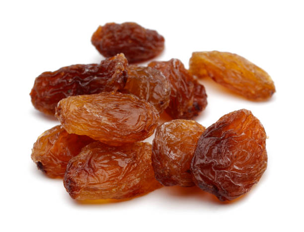istock Golden raisin isolated on white 1130541744