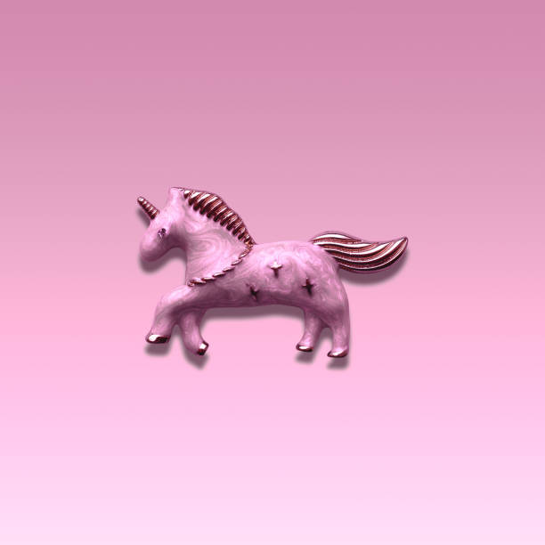 istock The pink unicorn brooch isolated on   a pink gradient background. 1130543767