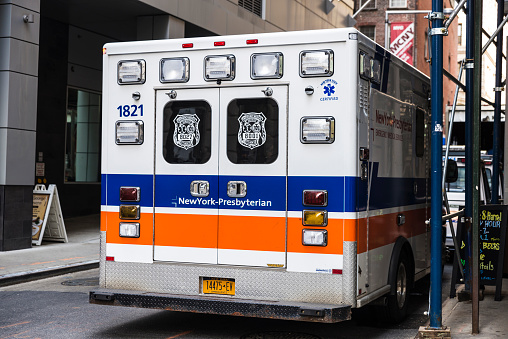 New York City, USA - July 27, 2018: Ambulance car of New York Presbyterian parked on a street in Manhattan in New York City, USA