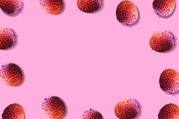 istock Lychee fruits colorful pattern on a pastel pink background. 1130544565