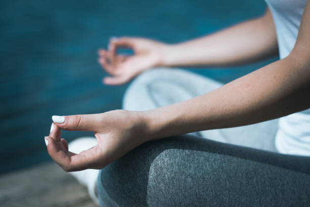 istock Woman meditating 1130547959