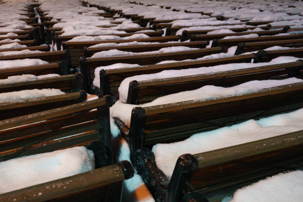 The benches in the park are folded for the winter. Waiting for Spring.