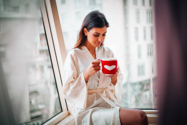 istock Woman with Cap of Coffee 1130549264