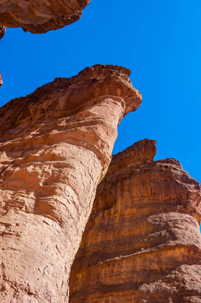 istock Amazing famous Solomon Pillars ancient high rocks cliffs with narrow ravines in Timna National Park in Aravah valley desert in Israel 1130549874