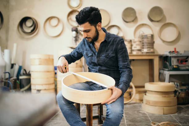istock Craftsman carving a darbuka 1130550219