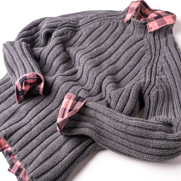 istock Gray wool sweater and checkered pink shirt on a white background. 1130551126