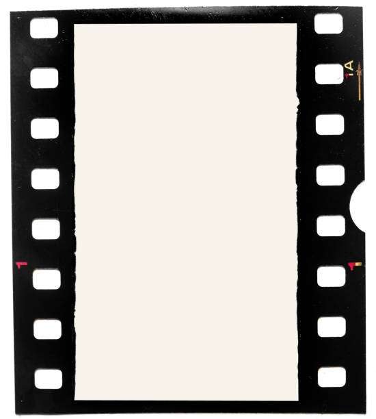real macro photo of grungy looking 35mm filmstrip or film frame on white background stock photo