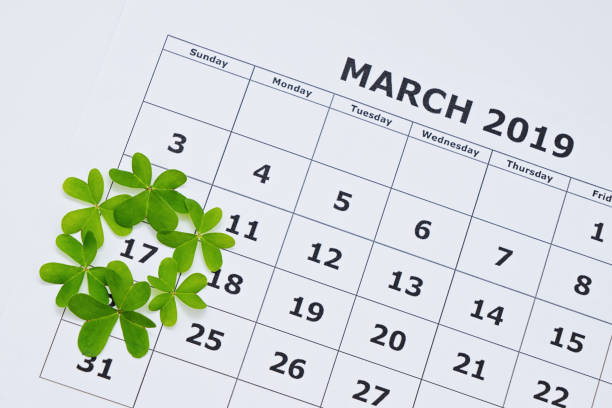 istock Frame from clover leaves on calender date March 17 1130552587