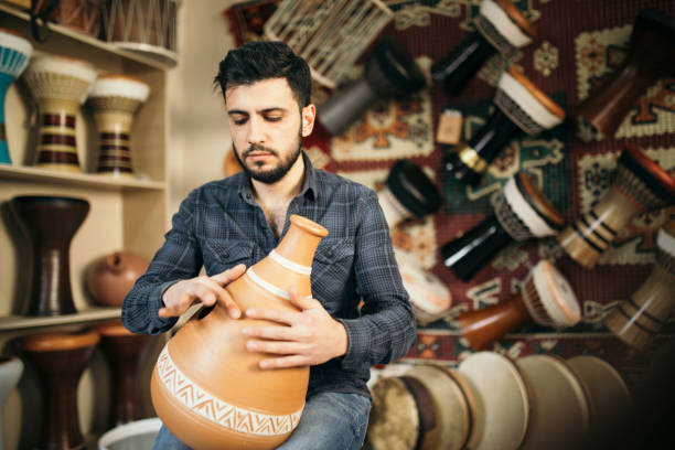 istock Turkish Man Playing Clay Darbuka 1130554223