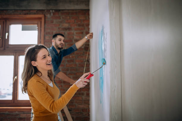 istock Painting together 1130554373