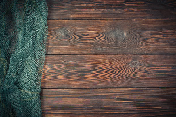 istock Grid on a wooden background 1130555759