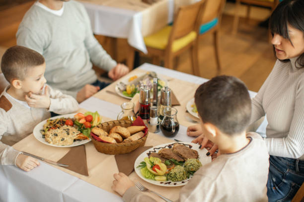 istock Family at lunch in hotel restaurant 1130555899