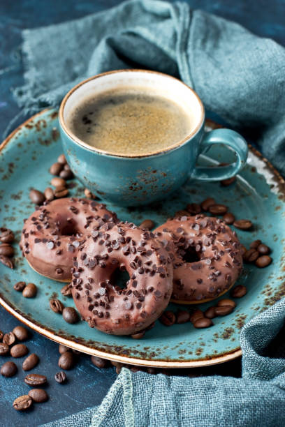 istock Tasty sweet donuts  and coffee mug 1130557269