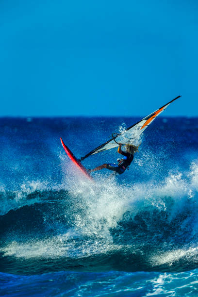 Island of Maui in Hawaii on December 27, 2012: Surfing at Hookipa Beach on Maui