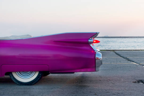 istock Convertible Pink Classic Car Tail Fin And Rear Light 1130559544