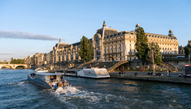 Tourboat on Seine River in Paris, France Tourboat on Seine River in Paris, France. musee dorsay stock pictures, royalty-free photos & images