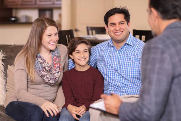 istock Family counseling session at home with therapist. 1130564599