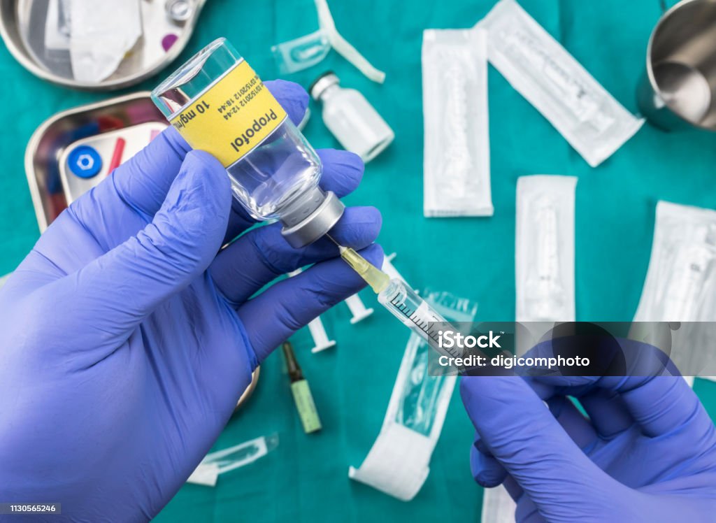 Nurse preparing hospital medication with propofol, conceptual image, horizontal composition Propofol Stock Photo