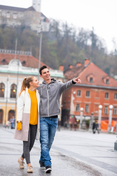 istock Young couple walking in the city 1130565956