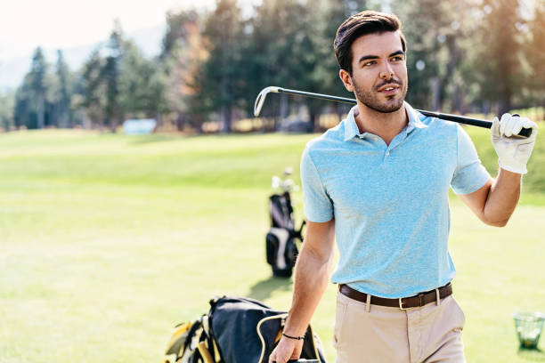 istock Golf player walking on the playground 1130570019