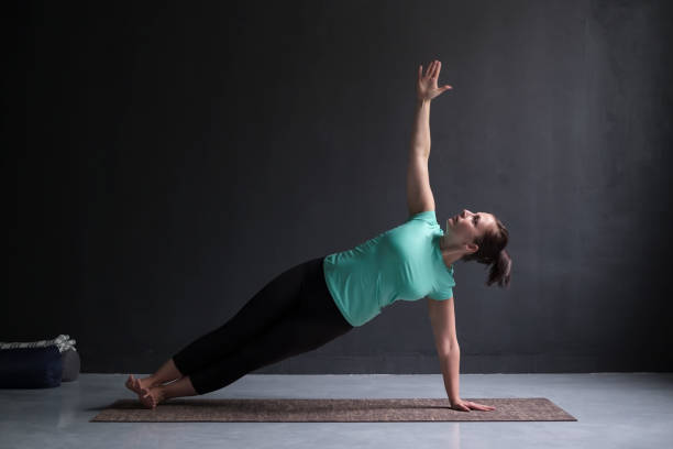 istock Model doing Side Plank Posture, Pose of Vashista, Vasisthasana 1130570660