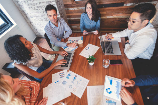 istock Group of people meeting with technology. 1130571105